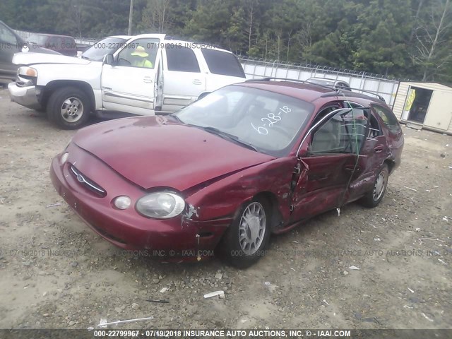 1FAFP58S8XA278860 - 1999 FORD TAURUS SE COMFORT SILVER photo 2