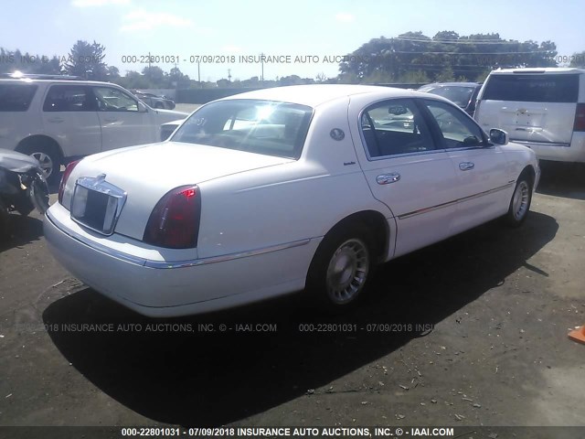 1LNHM81W3XY683103 - 1999 LINCOLN TOWN CAR EXECUTIVE WHITE photo 4