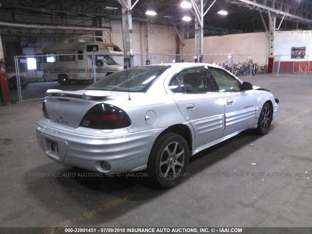 1G2NF52E11M553183 - 2001 PONTIAC GRAND AM SE1 SILVER photo 4