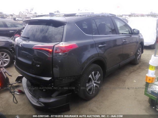 2T3ZFREV7GW275692 - 2016 TOYOTA RAV4 LE GRAY photo 4