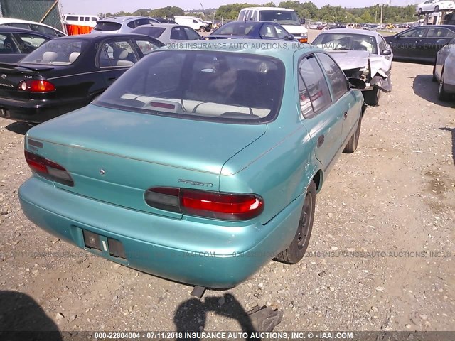 1Y1SK5364RZ085378 - 1994 GEO PRIZM LSI GREEN photo 4