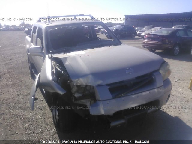 1N6ED27T01C317764 - 2001 NISSAN FRONTIER CREW CAB XE/CREW CAB SE SILVER photo 1