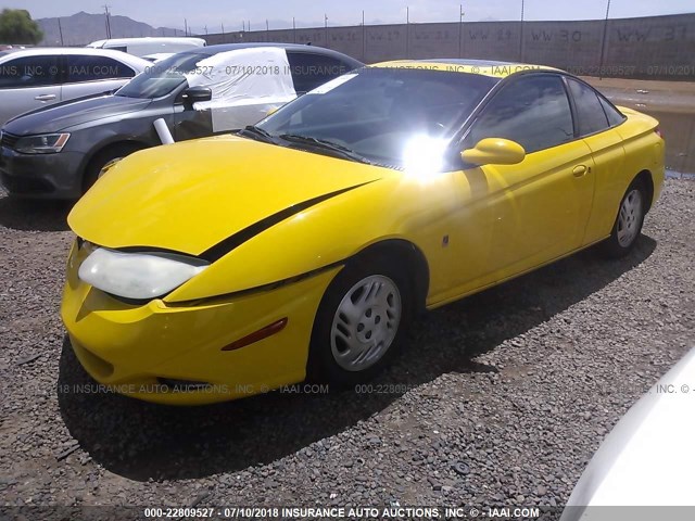 1G8ZY12781Z106235 - 2001 SATURN SC2 YELLOW photo 2