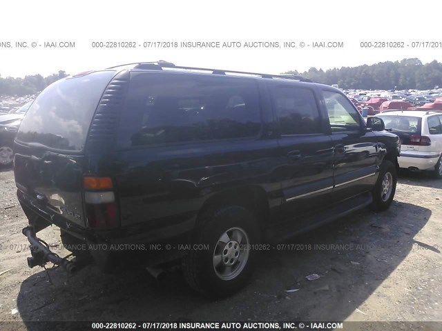 1GNEC16Z13J258252 - 2003 CHEVROLET SUBURBAN C1500 BLACK photo 4