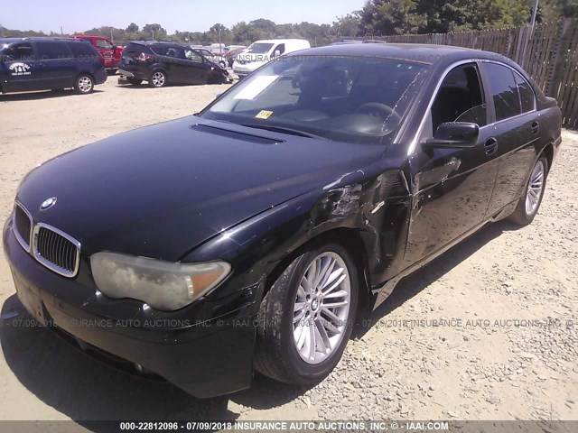 WBAGL63504DP72705 - 2004 BMW 745 I BLACK photo 2