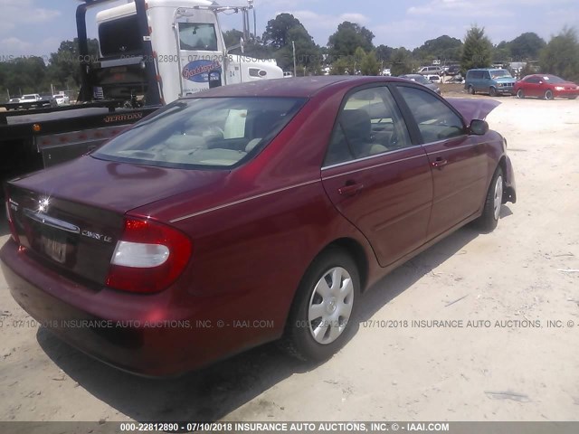 JTDBE32K520103010 - 2002 TOYOTA CAMRY LE/XLE/SE RED photo 4