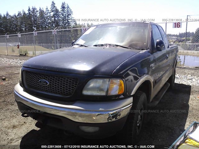 2FTPX18L6YCB18928 - 2000 FORD F150 BLACK photo 2