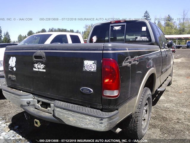 2FTPX18L6YCB18928 - 2000 FORD F150 BLACK photo 4