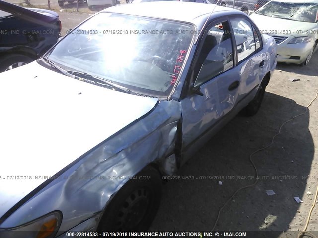 1NXAE09B6SZ231082 - 1995 TOYOTA COROLLA LE/DX ღია ლურჯი ფოტო 6