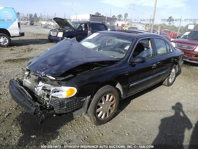 1LNHM97V61Y690039 - 2001 LINCOLN CONTINENTAL  BLACK photo 2