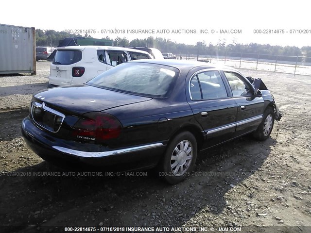 1LNHM97V61Y690039 - 2001 LINCOLN CONTINENTAL  BLACK photo 4