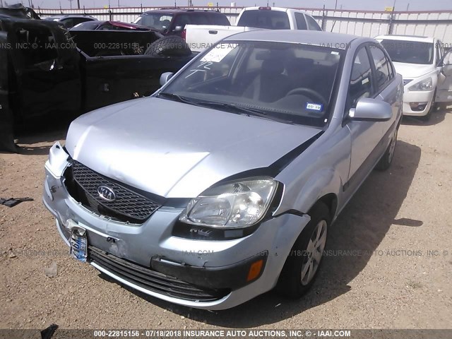 KNADE223996509713 - 2009 KIA RIO LX/SX BLUE photo 2