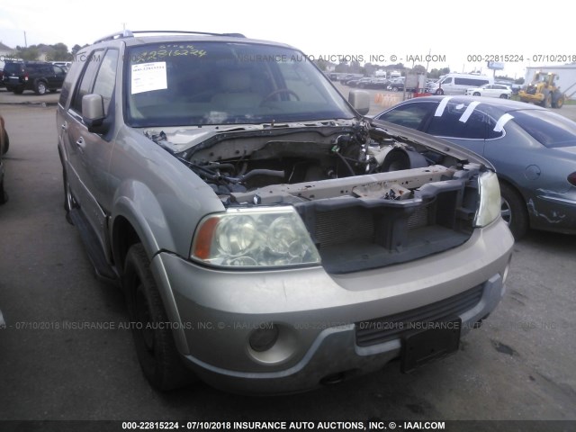 5LMFU27R74LJ19420 - 2004 LINCOLN NAVIGATOR GOLD photo 1