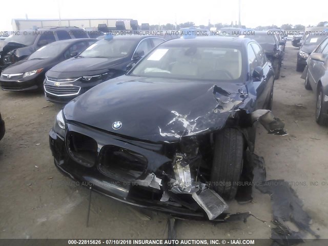 WBAKC8C53CC436699 - 2012 BMW 750 LXI BLACK photo 6