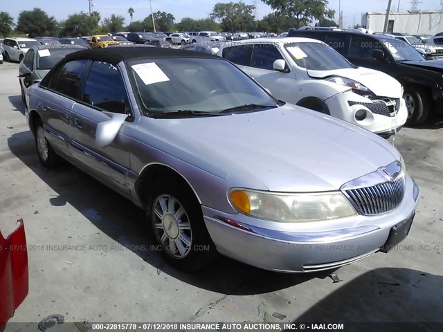 1LNHM97V0YY920264 - 2000 LINCOLN CONTINENTAL  SILVER photo 1