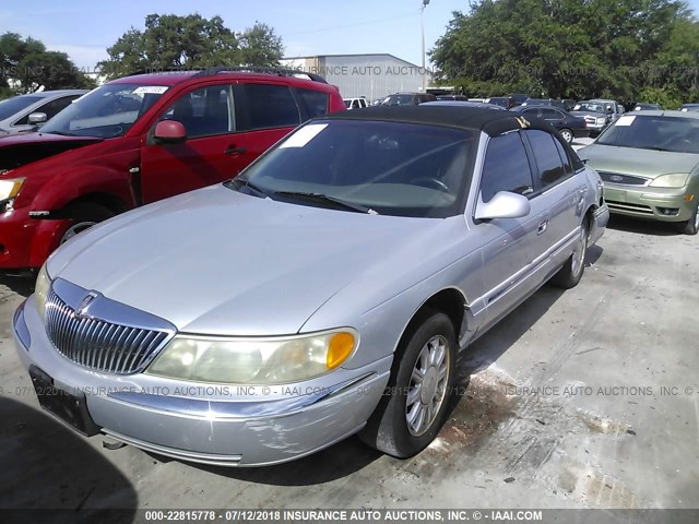 1LNHM97V0YY920264 - 2000 LINCOLN CONTINENTAL  SILVER photo 2