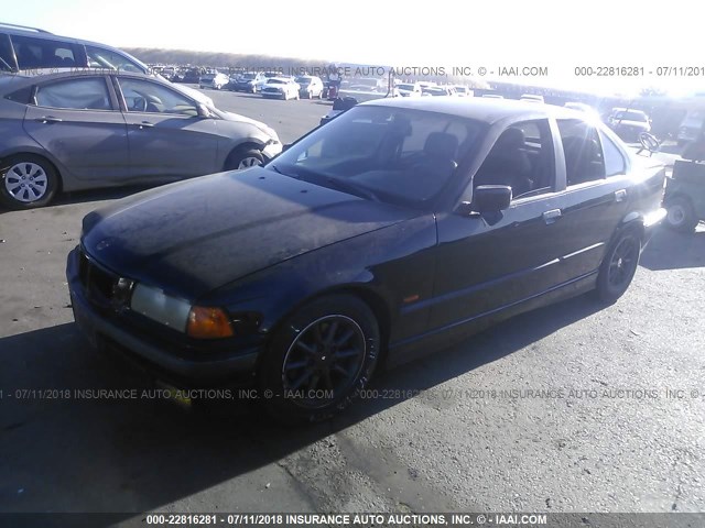 WBACC9326WEE60989 - 1998 BMW 318 I BLACK photo 2