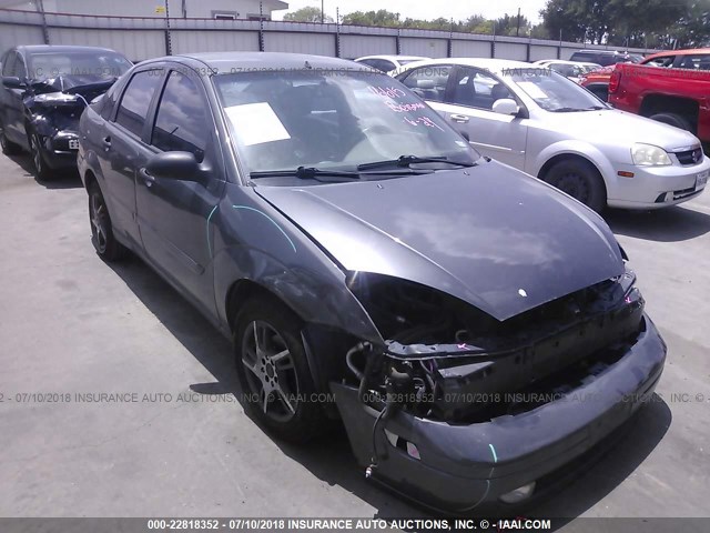 1FAFP38Z04W137216 - 2004 FORD FOCUS ZTS GRAY photo 1