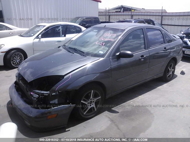 1FAFP38Z04W137216 - 2004 FORD FOCUS ZTS GRAY photo 2