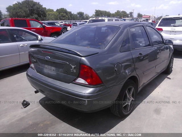 1FAFP38Z04W137216 - 2004 FORD FOCUS ZTS GRAY photo 4