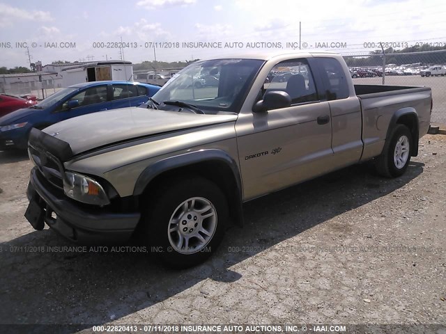 1B7GL12XX2S530859 - 2002 DODGE DAKOTA SXT TAN photo 2