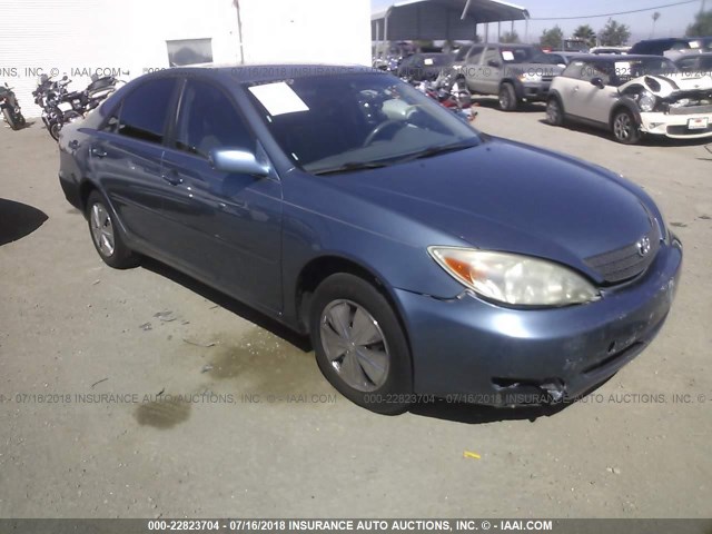 JTDBE32K230180614 - 2003 TOYOTA CAMRY LE/XLE Light Blue photo 1