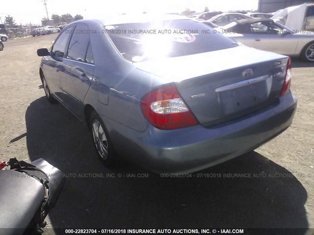 JTDBE32K230180614 - 2003 TOYOTA CAMRY LE/XLE Light Blue photo 3