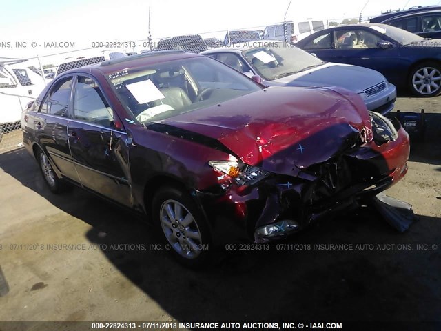 JTDBF32K530105919 - 2003 TOYOTA CAMRY LE/XLE RED photo 1