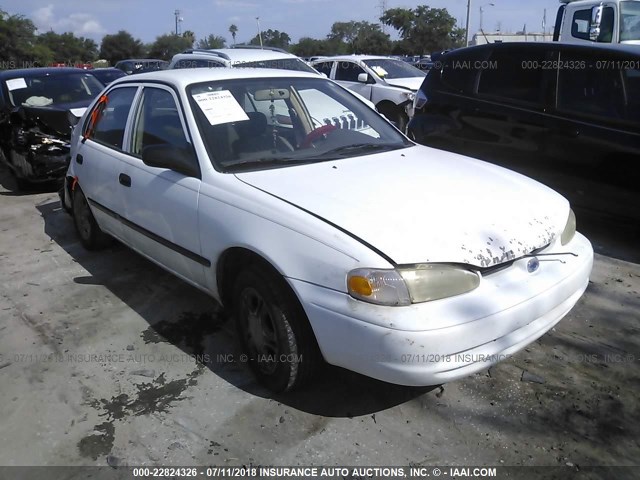 1Y1SK5288XZ405379 - 1999 CHEVROLET GEO PRIZM LSI WHITE photo 1