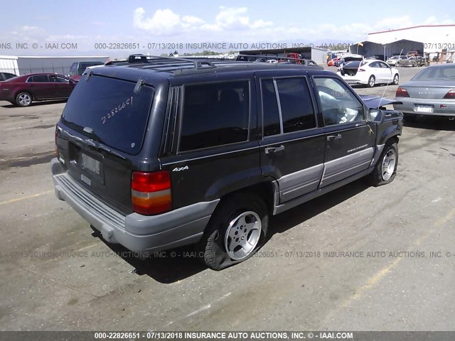 1J4GZ58S8WC312298 - 1998 JEEP GRAND CHEROKEE LAREDO/TSI BLACK photo 4