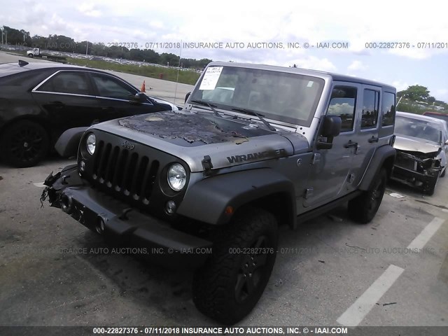 1C4BJWDG9HL666817 - 2017 JEEP WRANGLER UNLIMITE SPORT GRAY photo 2