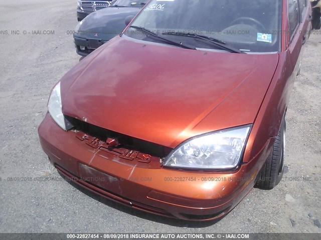 3FAFP37N95R101818 - 2005 FORD FOCUS ZX5 ORANGE photo 6