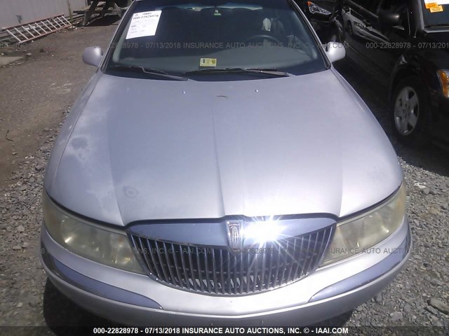 1LNHM97V4XY675127 - 1999 LINCOLN CONTINENTAL  Silber Foto 6