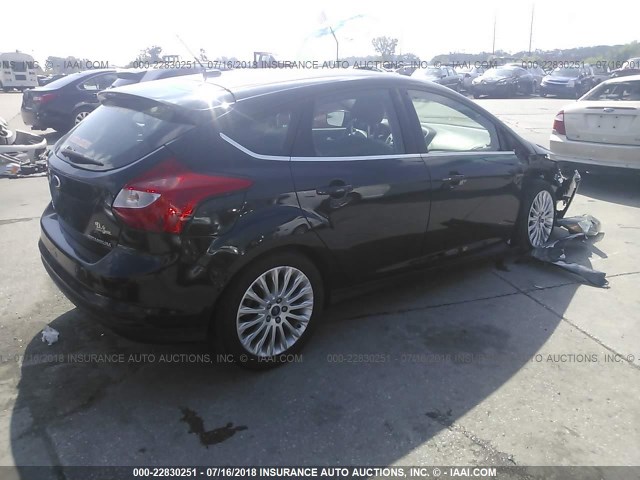 1FAHP3N25CL158109 - 2012 FORD FOCUS TITANIUM BLACK photo 4