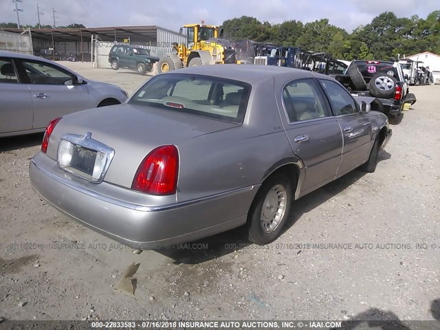 1LNHM81W4XY684910 - 1999 LINCOLN TOWN CAR EXECUTIVE GOLD photo 4
