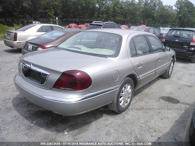 1LNHM97V32Y696303 - 2002 LINCOLN CONTINENTAL  SILVER photo 4