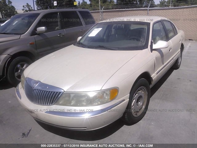 1LNLM97V9WY603994 - 1998 LINCOLN CONTINENTAL  Бежевый фото 2