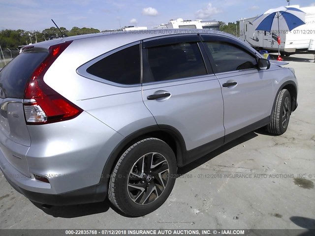 2HKRM3H41GH558540 - 2016 HONDA CR-V SE SILVER photo 4