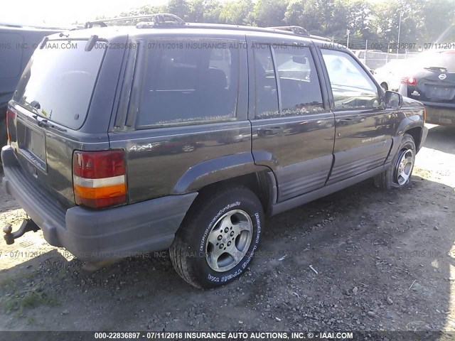 1J4GZ58S5WC134141 - 1998 JEEP GRAND CHEROKEE LAREDO/TSI BLACK photo 4