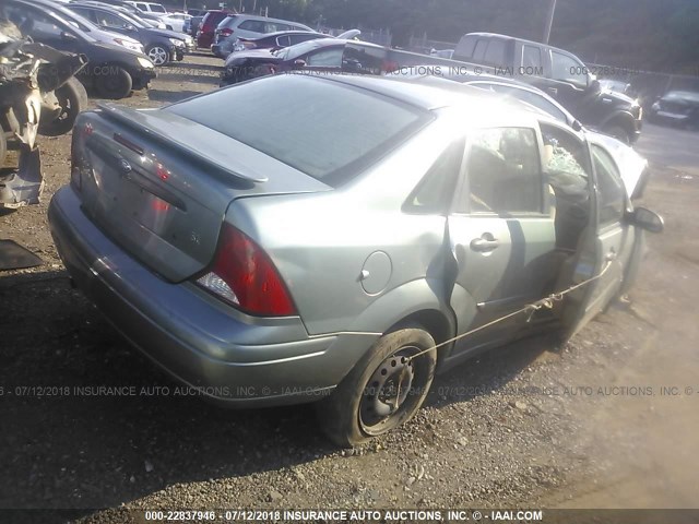 1FAFP34374W147663 - 2004 FORD FOCUS SE COMFORT/SE SPORT GREEN photo 4