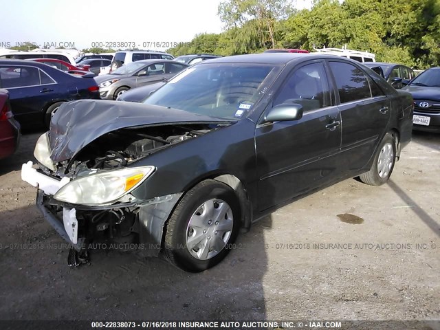 JTDBE32K040252959 - 2004 TOYOTA CAMRY LE/XLE BLUE photo 2