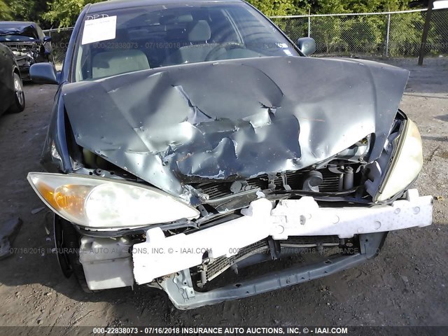 JTDBE32K040252959 - 2004 TOYOTA CAMRY LE/XLE BLUE photo 6