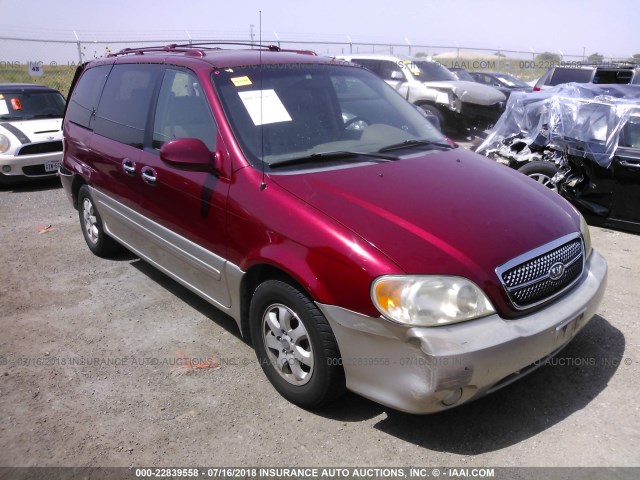 KNDUP131546601219 - 2004 KIA SEDONA EX/LX MAROON photo 1