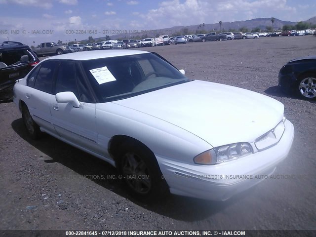 1G2HX52KXXH200717 - 1999 PONTIAC BONNEVILLE SE WHITE photo 1