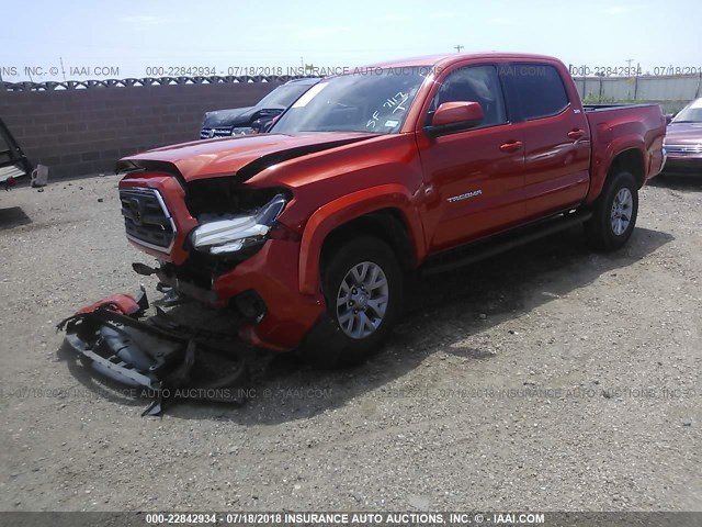 5TFCZ5AN4GX042456 - 2016 TOYOTA TACOMA DBL CAB/SR/SR5/TRD SPT/OR ORANGE photo 2