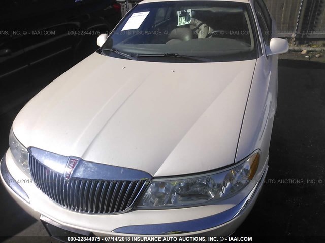 1LNFM97V5WY638836 - 1998 LINCOLN CONTINENTAL  TAN photo 6