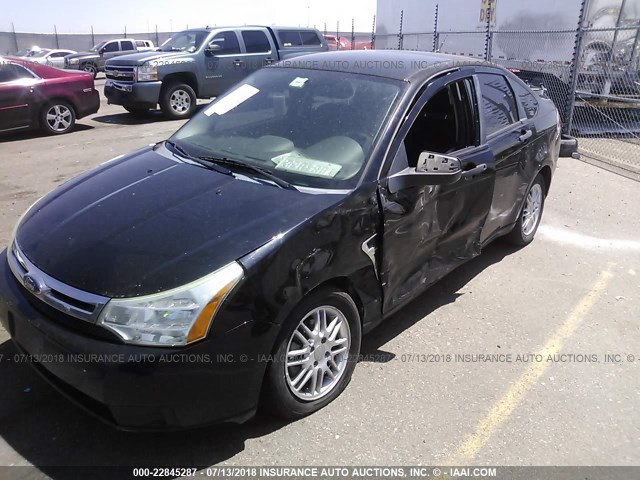 1FAHP35N78W111423 - 2008 FORD FOCUS SE/SEL/SES BLACK photo 6