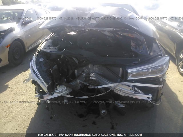 WBA7F0C58JGM23130 - 2018 BMW 750 I Dark Blue photo 6