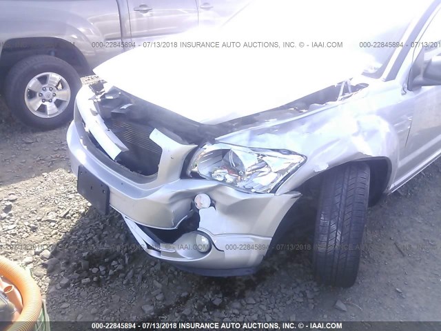 1B3CB3HA4BD166749 - 2011 DODGE CALIBER MAINSTREET SILVER photo 6