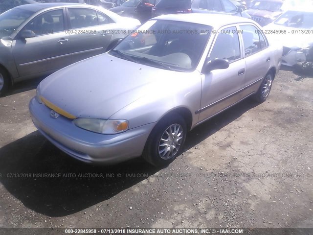 1Y1SK5488XZ410983 - 1999 CHEVROLET GEO PRIZM LSI SILVER photo 2